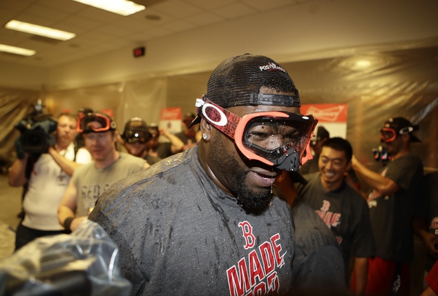 Boston Red Sox designated hitter David Ortiz celebrates with teammates after the Red Sox the AL East title, following a baseball game against the New York Yankees on Wednesday, Sept. 28, 2016, in New York. (AP Photo/Frank Franklin II)