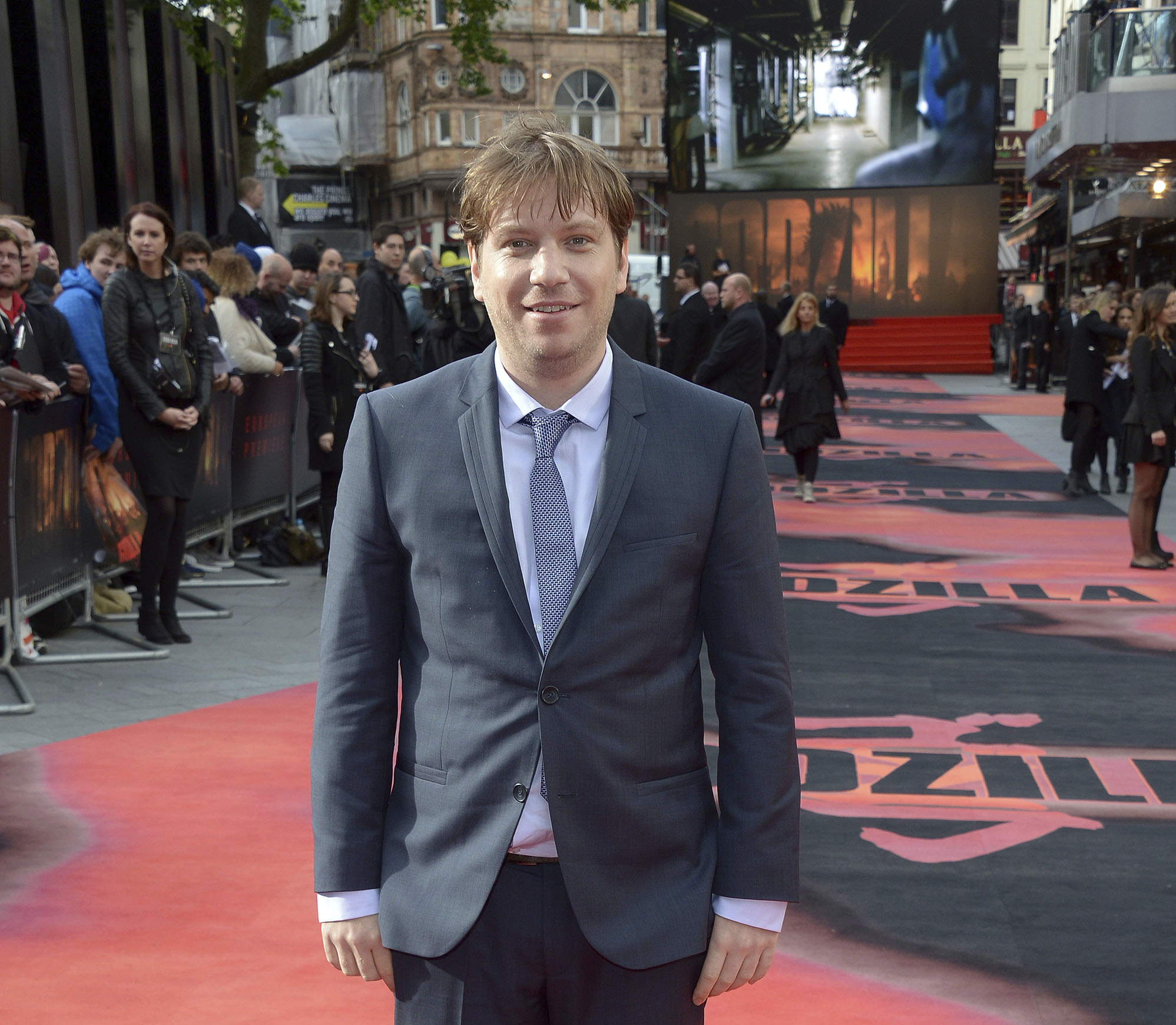 FILE - In this May 11, 2014 file photo, director Gareth Edwards poses for photographers on the red carpet for the UK premiere of Godzilla in London. Edwards says he gave himself a cameo in the "Star Wars" spinoff "Rogue One: A Star Wars Story." Arriving in theaters on Dec. 16, 2016, "Rogue One" is the first in a series of spinoffs set inside the universe of "Star Wars." (Photo by Jon Furniss/Invision/AP, File)