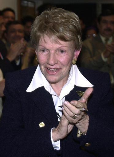 FILE - In this  Jan. 23, 2001 file photo, Sofia Imber, founder and former director of the Caracas Contemporary Art Museum, applauds before a news conference in Caracas, Venezuela. Imber's biographer Diego Arroyo Gil, reported Monday, Feb 20, 2017, that she has died in Caracas. (AP Photo/ Fernando Llano, File)