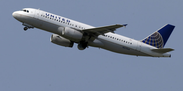 HOLD FOR BUSINESS PHOTO-- This is a United Airlines jet taking off from Pittsburgh International Airport on Tuesday, July 23, 2013 in Imperial, Pa. (AP Photo/Gene J. Puskar)